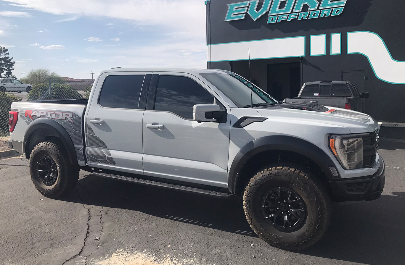Offroad truck parked outside shop
